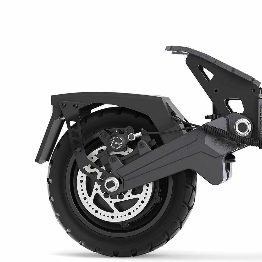 Close-up of the rear wheel and suspension components of the black Ausom DT2 Pro electric scooter featuring a 10-inch tubeless rubber tire and disc brake system.